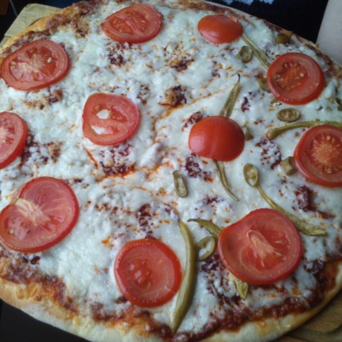 Ezen a képen: Pizza egy olasztól