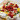 Pavlova-torta savanykás citromcurd-del és gyümölcsökkel